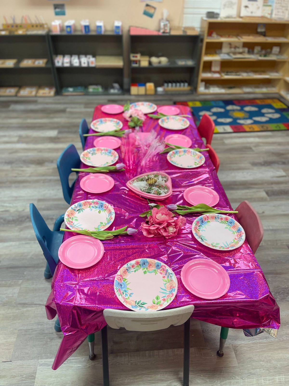 A Montessori classroom table set for a family celebration at Wonderful Montessori Preschool